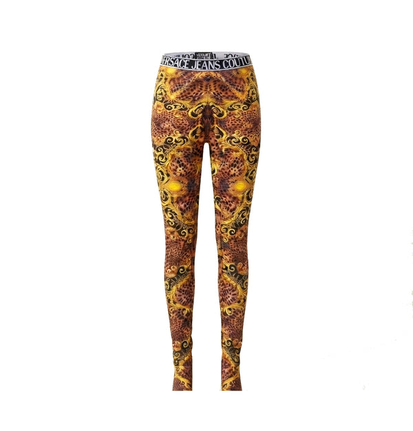 High-waisted leggings with a vibrant yellow, orange, and brown paisley pattern, featuring a black and white 