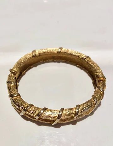 1960s GIVENCHY CUSTOME JEWELLERY SLAVE GILT BANGLE BRACELET - STYLE-CHNGR